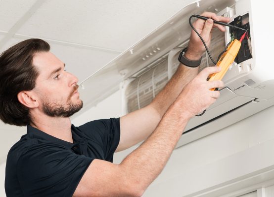 Electrician supporting electrical wiring, electrical outlets, switches, electricity supply and power outage prevention
